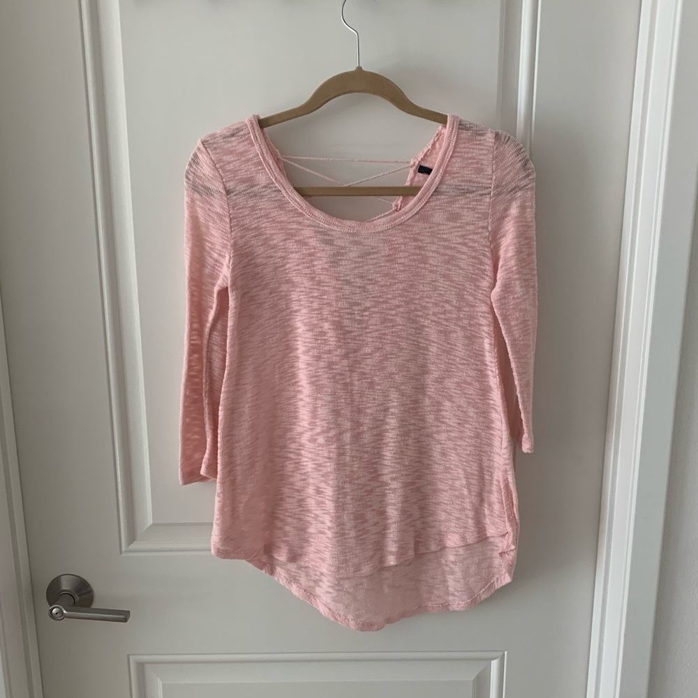 Pink blouse lace-up in the back.